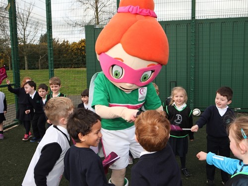 4. Fist bumps for the children at St. Macartan's Primary from Sweet Caroline.JPG