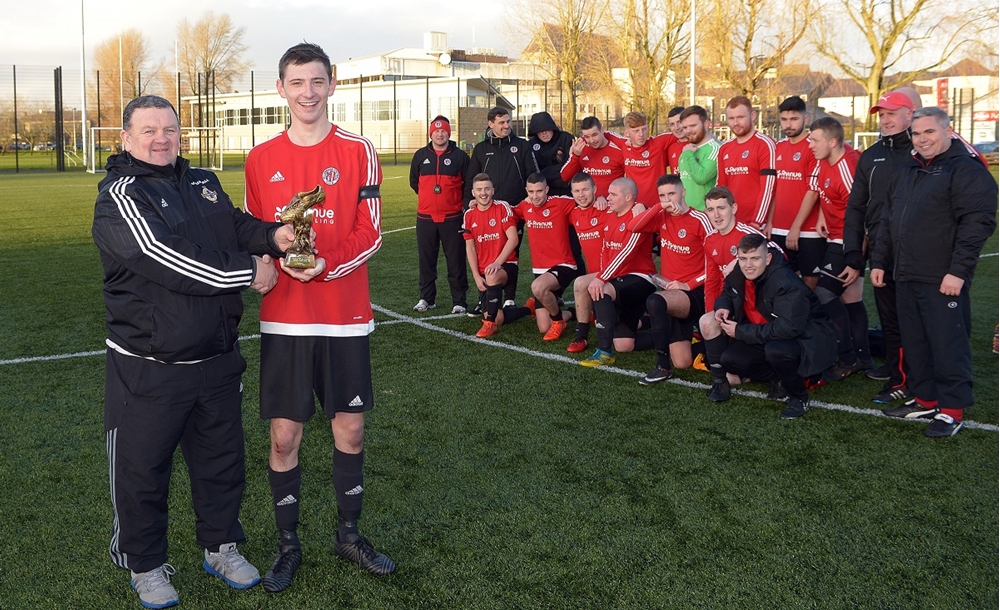 Enda Love of the Irish FA Junior committee presents the “Man of the Match” trophy to Willowbanks Richard McAvoy.jpg