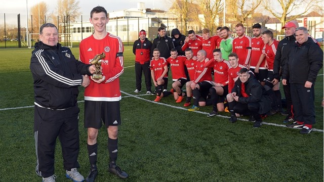Enda Love of the Irish FA Junior committee presents the “Man of the Match” trophy to Willowbanks Richard McAvoy.jpg 