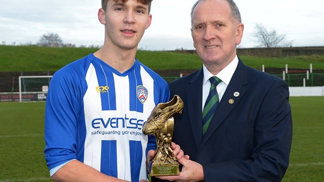 Ben Wilson receives his Man of the Match award from IFA Youth Committee member Robert Doherty.jpg (1) 
