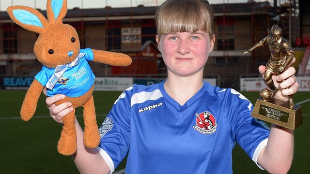 Courtney Moore with player of match award and Electric Ireland Bunny.jpg 