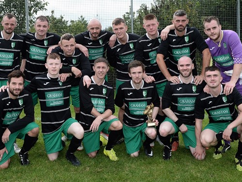 Tullymore Swifts with man of the match Thomas Murray.jpg