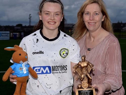 Tyler Toland of Sion Swifts Ladies recieves her Player of the Match trophy and Electric Ireland Bunny from Elaine J.jpg