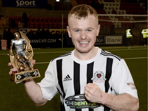 David Cassells with the man of the match trophy.jpg