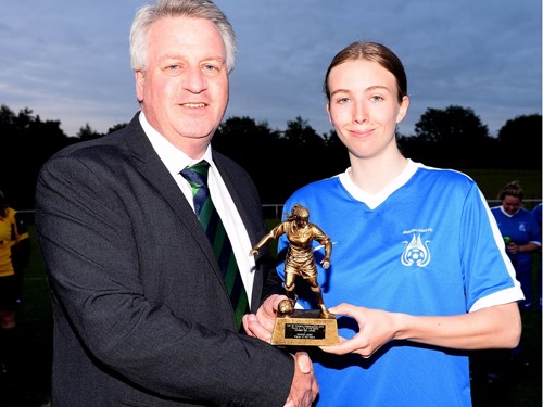 Player of the Match Eve Edmondson receives her trophy from Neil Morrow.jpg