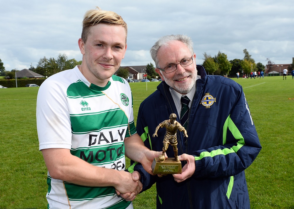 Man of Match Josh McCarten of Armagh Celtic with Brian Larkin.jpg