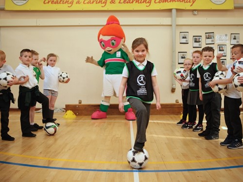1. 7 year old Roisin Sherman from Kilcooley P.S. in Bangor practices her penalties against Sweet Caroline.JPG