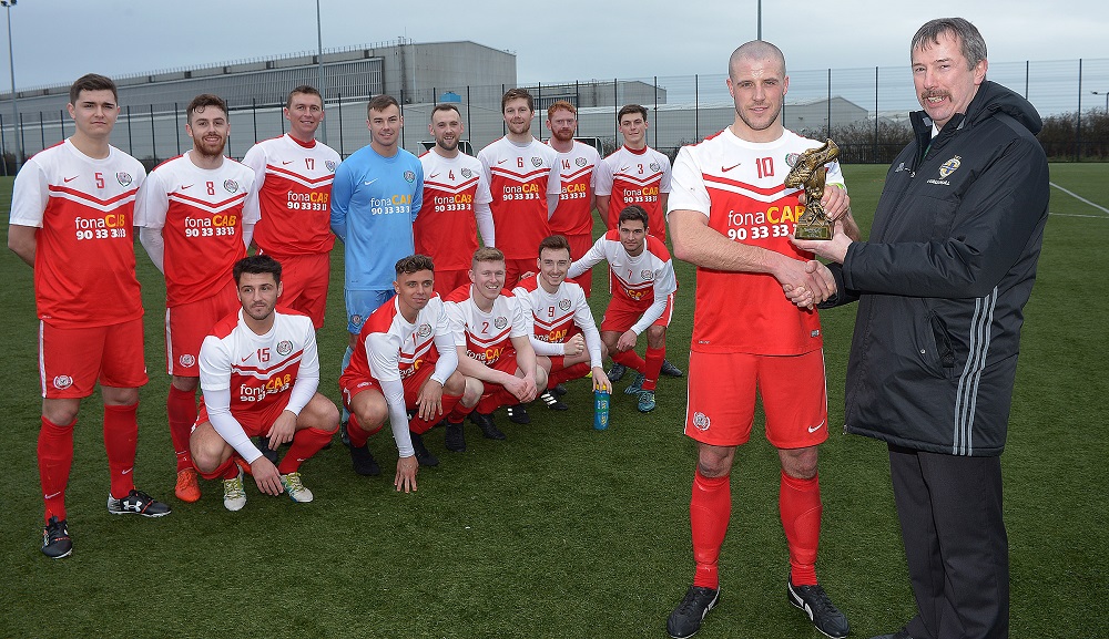 Alistair Gray of the Irish FA Intermediate Committee presents Dundela's Mark McClelland with his 'Man of the Match' trophy.jpg