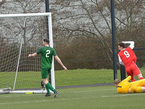 Karl Devine opens the scoring for Dundela.jpg