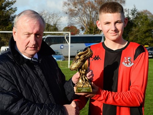 MOM James Holland with Desi Bradley of the IrishFA Youth and Junior Committee.jpg