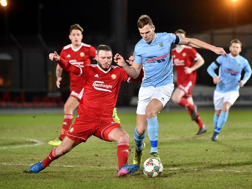 Kevin Braniff and Leroy Millar tussle for possession.jpg