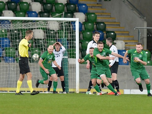 Paul Pringent wheels away after scoring Crumlin Stars winning goal.jpg