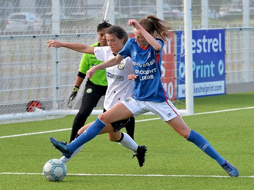 Player of Match Caitlin McGuinness in action 2.jpg