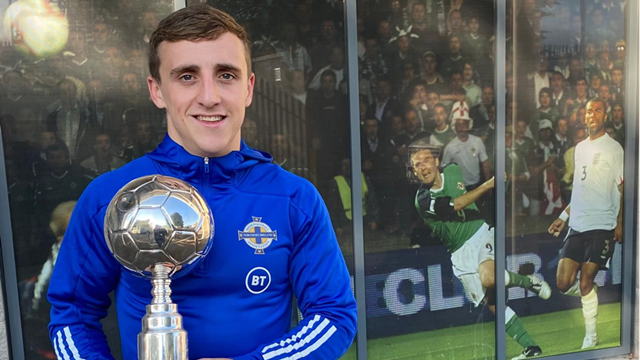 Joel Cooper with trophy.png 