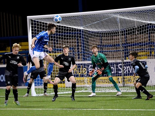 9 Coleraine's Kirk McLaughlin heads his side into a 2-1 lead .jpg