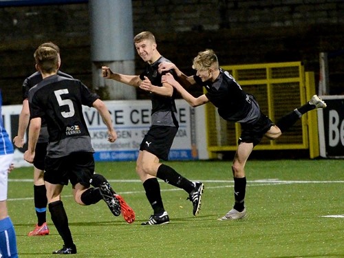 Ballymena's Caleb Crawford celebrates after scoring the opening goal.jpg
