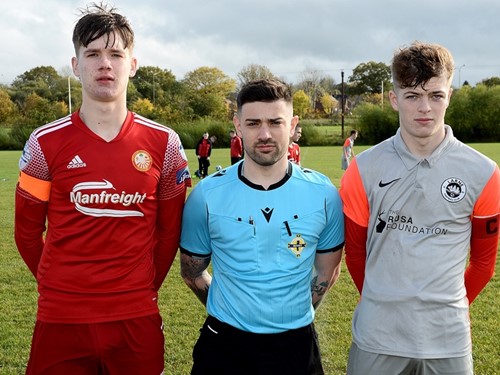 Portadown skipper Harry Murphy, referee Adam Courtiff and Larne Youth captain Max Greer.jpg