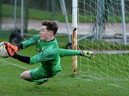 Cliftonville Strollers keeper Orann Donnely saves in the penalty shootout.jpg