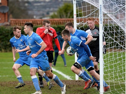 Marc Fell pulls a goal back for Finaghy.jpg
