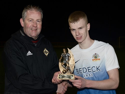 Glenavon's Bradley Ingram is presented with his Man of the Match trophy by Maurice Johnston of the Irish FA Junior and Youth Committee..jpg