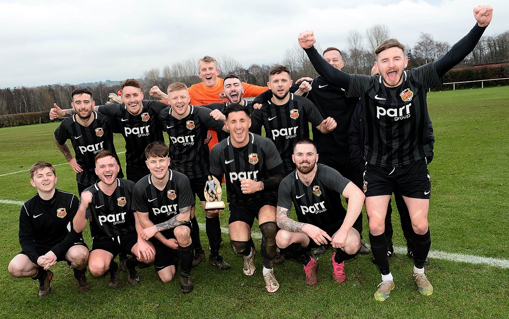 East Belfast celebrate their 6-0 victory over Ballymacash Rangers.jpg