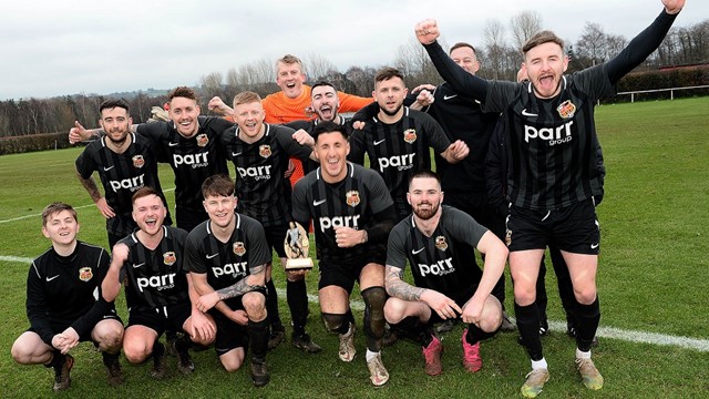 East Belfast celebrate their 6-0 victory over Ballymacash Rangers.jpg 