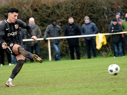 Daniel Purkis scores from the spot for his hat-trick goal.jpg