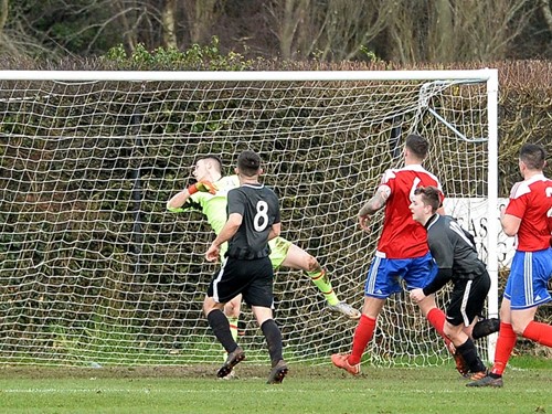 Dean Annett scores with a looping header.jpg