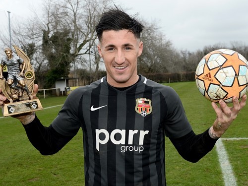 Man of the Match Daniel Purkis with his trophy and the match ball.jpg