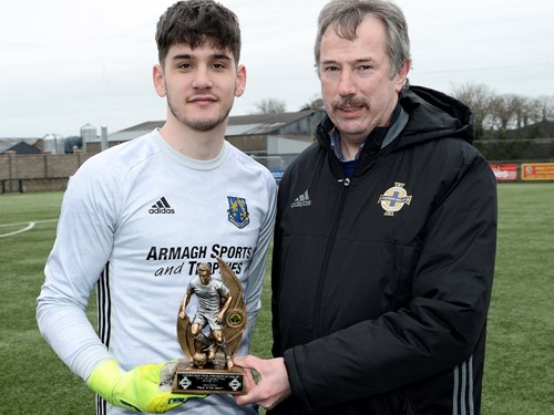 Connor Byrne recieves his man of the match trophy from Irish FA Intermediate Committee Vice Chairman Alistair Gray.jpg