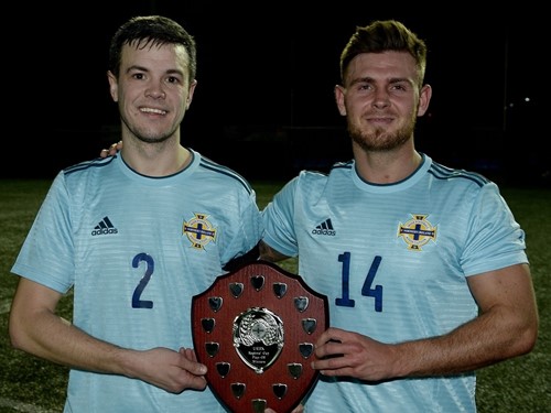 Eastern Region captain Scott McMillan and goalscorer Anto Burns with Regions Cup Shield.jpg