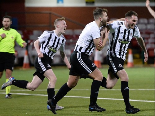 Sam Howell wheels away after giving Bangor YM the lead.jpg