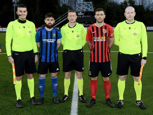 Match officials and captains.jpg