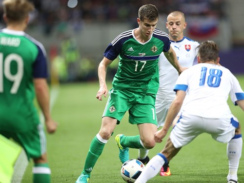 Paddy McNair takes on Dusan Svento.jpg