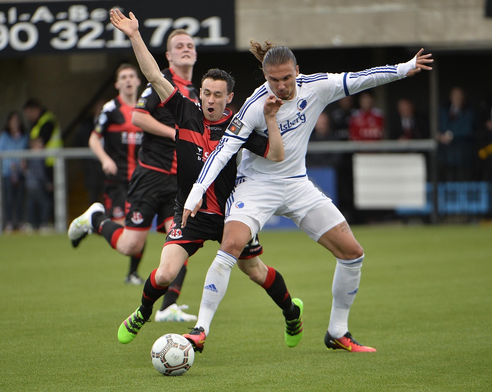 Paul Heatley battles for possession with Erik Johansson.jpg