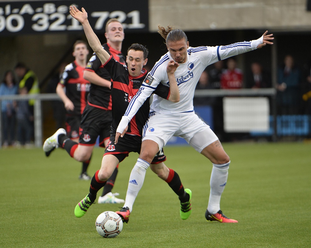 Paul Heatley battles for possession with Erik Johansson.jpg