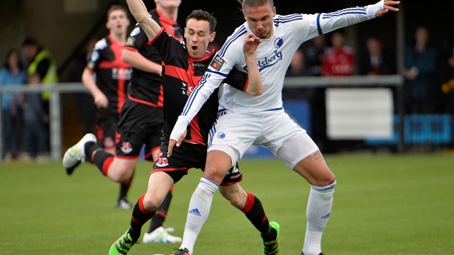 Paul Heatley battles for possession with Erik Johansson.jpg 