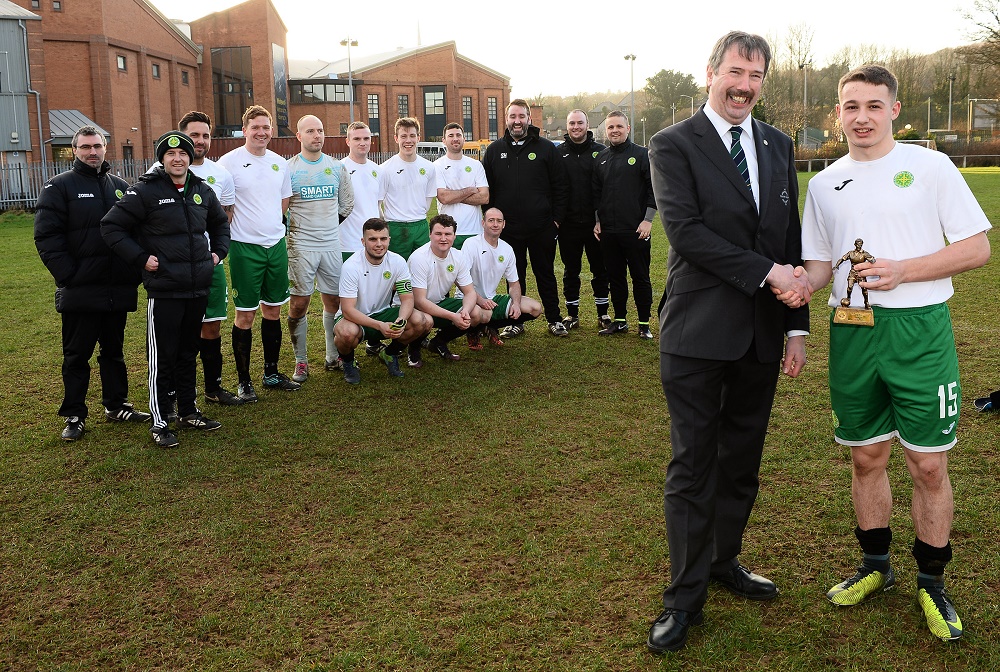 Man of the Match Presentation with team (002).jpg