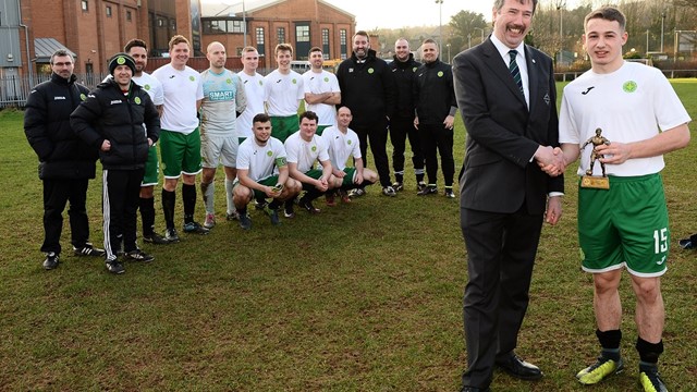 Man of the Match Presentation with team (002).jpg 