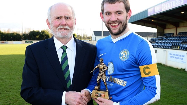 Gerry Stewart of the Irish FA Intermediate Cup Committee presents Limavady Utd